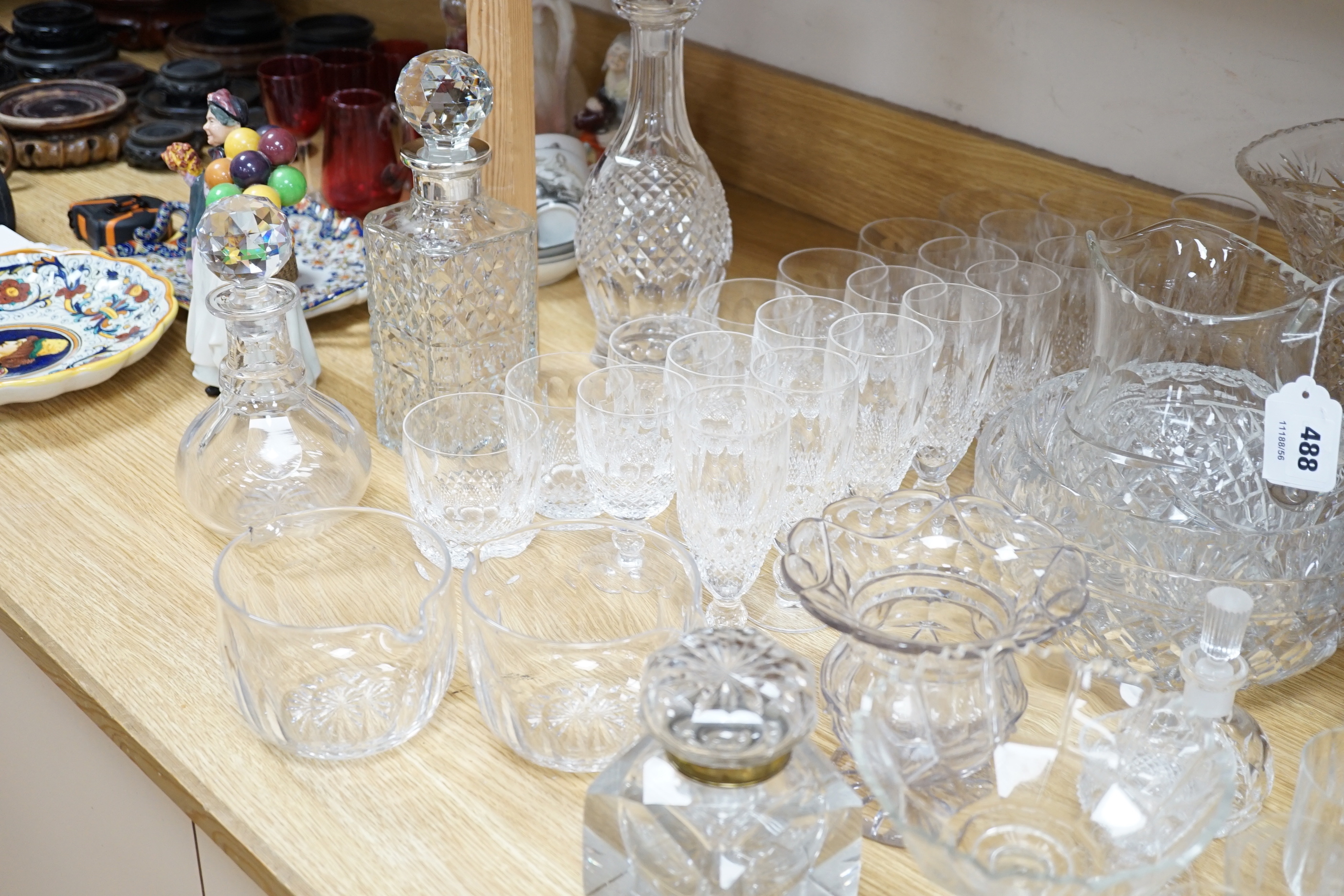 A Waterford cut crystal ‘’Colleen’’ pattern part suite of drinking glassware, together with a matching water jug and decanter and other glassware